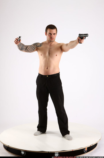 Man Adult Athletic White Fighting with gun Standing poses Pants