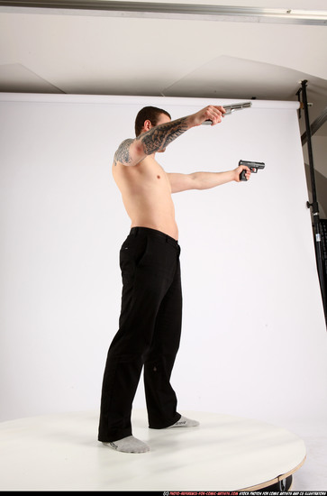 Man Adult Athletic White Fighting with gun Standing poses Pants