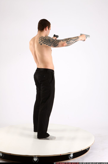 Man Adult Athletic White Fighting with gun Standing poses Pants