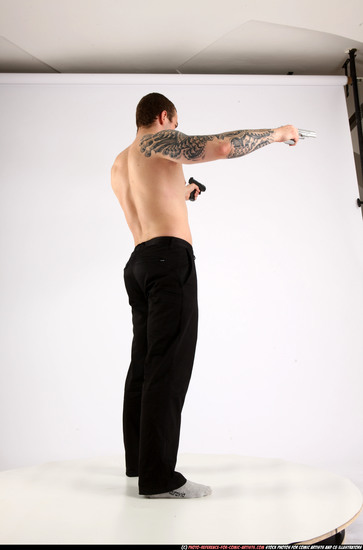 Man Adult Athletic White Fighting with gun Standing poses Pants