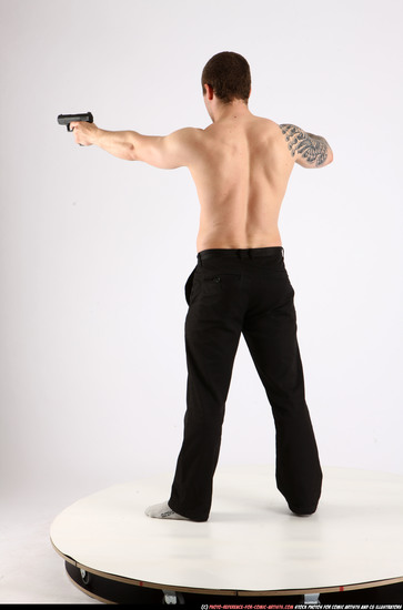 Man Adult Athletic White Fighting with gun Standing poses Pants