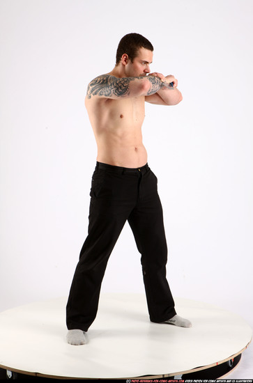 Man Adult Athletic White Fighting with knife Standing poses Pants