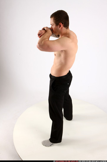 Man Adult Athletic White Fighting with knife Standing poses Pants