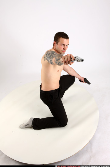 Man Adult Athletic White Fighting with gun Kneeling poses Pants