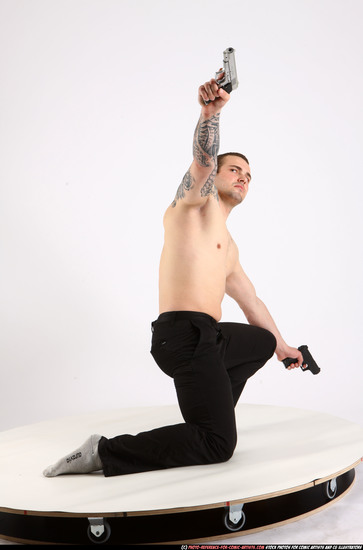 Man Adult Athletic White Fighting with gun Kneeling poses Pants