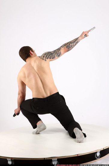 Man Adult Athletic White Fighting with gun Kneeling poses Pants