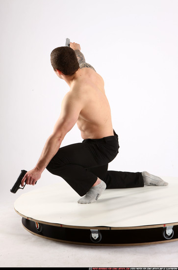 Man Adult Athletic White Fighting with gun Kneeling poses Pants