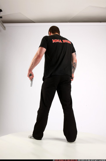 Man Adult Athletic White Fighting with gun Standing poses Casual