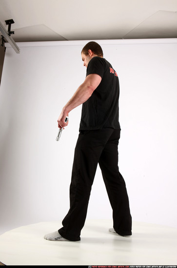 Man Adult Athletic White Fighting with gun Standing poses Casual