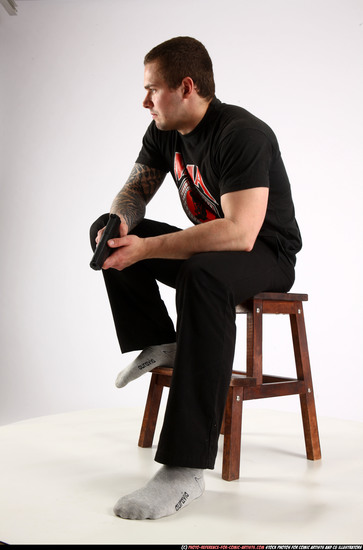 Man Adult Athletic White Fighting with gun Sitting poses Casual