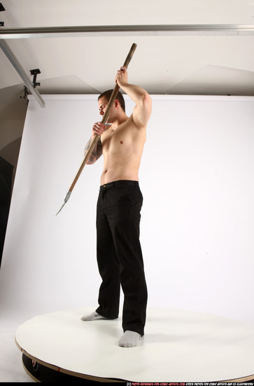 Man Adult Athletic White Fighting with spear Standing poses Pants