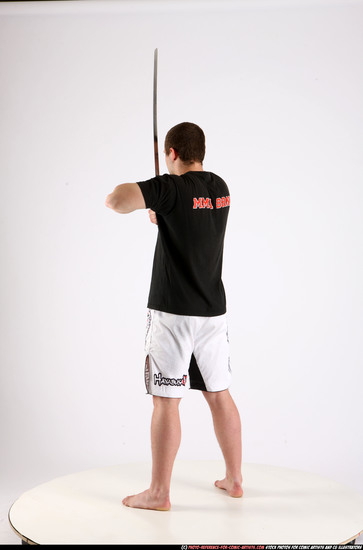 Man Adult Athletic White Fighting with sword Standing poses Sportswear