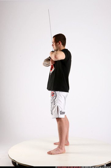 Man Adult Athletic White Fighting with sword Standing poses Sportswear