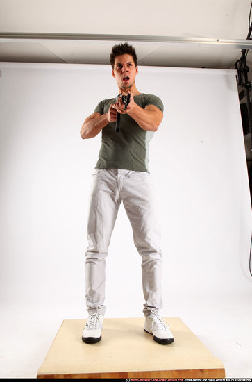 Man Adult Muscular White Fighting with submachine gun Standing poses Casual