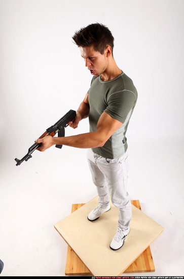 Man Adult Muscular White Fighting with submachine gun Standing poses Casual