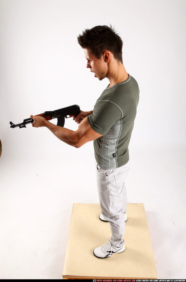 Man Adult Muscular White Fighting with submachine gun Standing poses Casual