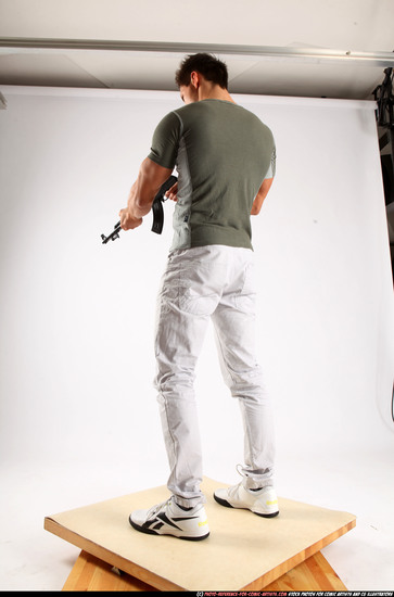 Man Adult Muscular White Fighting with submachine gun Standing poses Casual