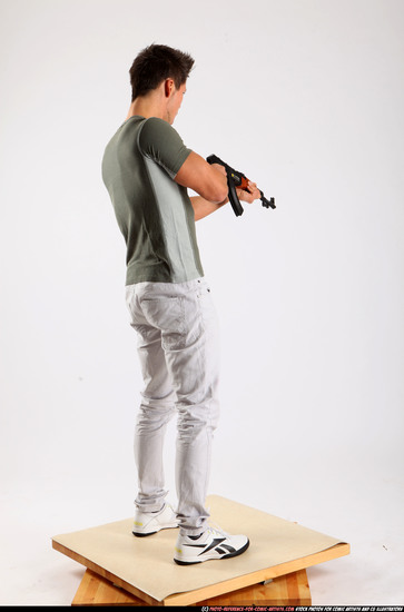 Man Adult Muscular White Fighting with submachine gun Standing poses Casual