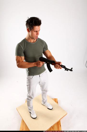 Man Adult Muscular White Fighting with submachine gun Standing poses Casual