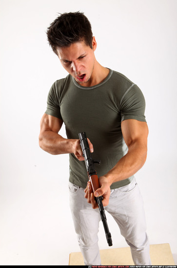 Man Adult Muscular White Fighting with submachine gun Standing poses Casual