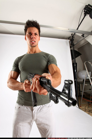 Man Adult Muscular White Fighting with submachine gun Standing poses Casual