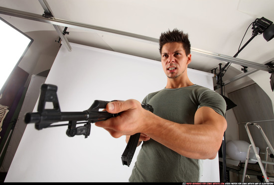 Man Adult Muscular White Fighting with submachine gun Standing poses Casual