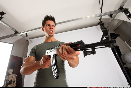 Man Adult Muscular White Fighting with submachine gun Standing poses Casual