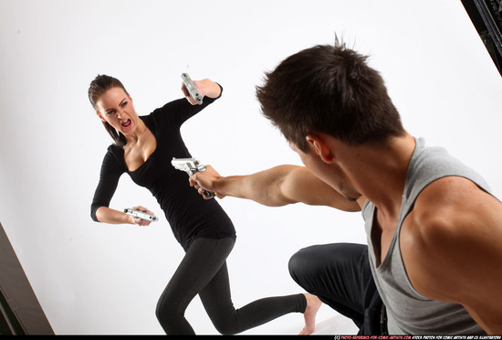 Man & Woman Adult Athletic White Fighting with gun Moving poses Casual