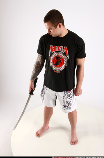 Man Adult Athletic White Fighting with sword Standing poses Sportswear