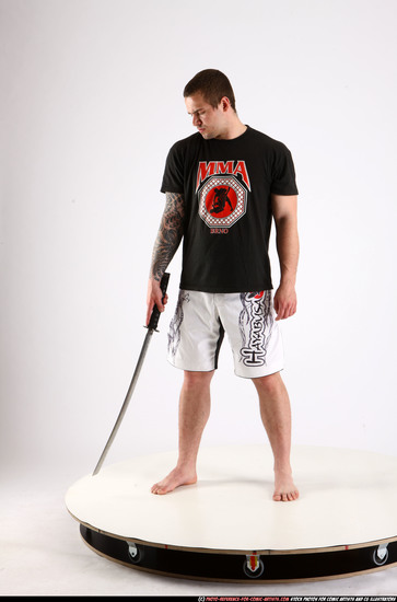 Man Adult Athletic White Fighting with sword Standing poses Sportswear