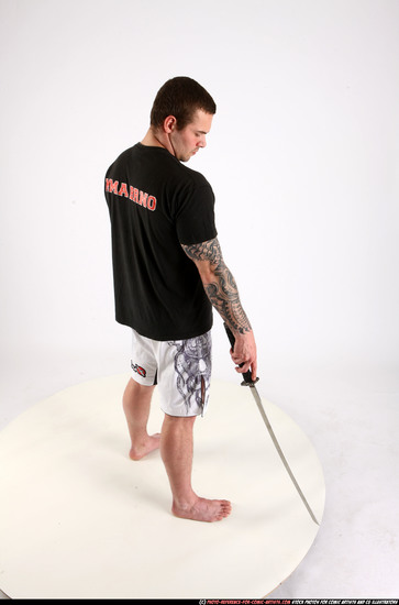 Man Adult Athletic White Fighting with sword Standing poses Sportswear