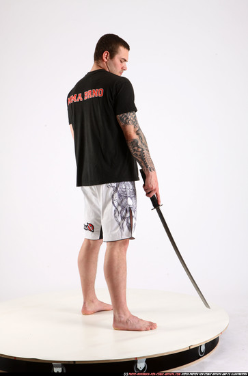 Man Adult Athletic White Fighting with sword Standing poses Sportswear