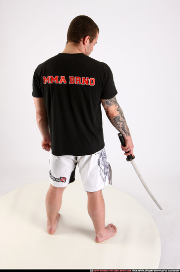 Man Adult Athletic White Fighting with sword Standing poses Sportswear