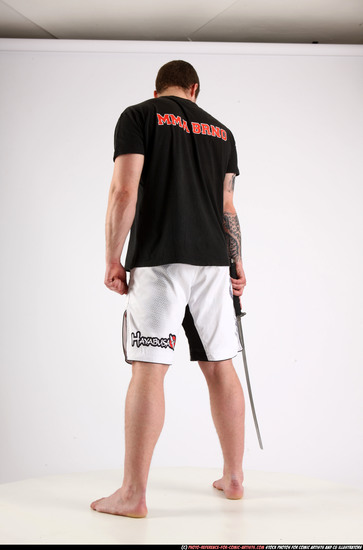 Man Adult Athletic White Fighting with sword Standing poses Sportswear