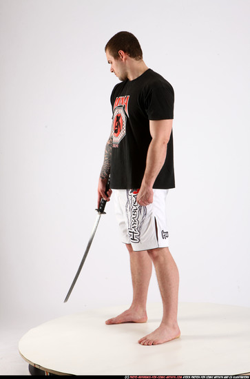 Man Adult Athletic White Fighting with sword Standing poses Sportswear