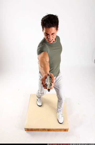 Man Adult Muscular White Fighting with gun Standing poses Casual