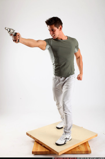 Man Adult Muscular White Fighting with gun Standing poses Casual