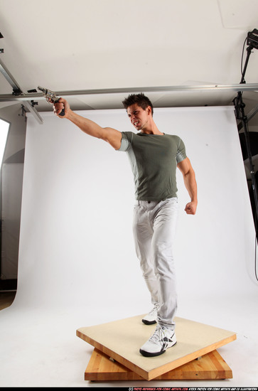 Man Adult Muscular White Fighting with gun Standing poses Casual