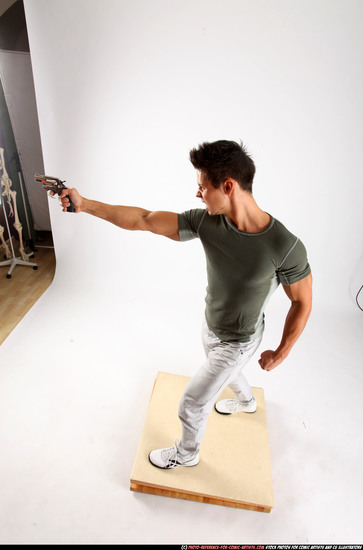 Man Adult Muscular White Fighting with gun Standing poses Casual