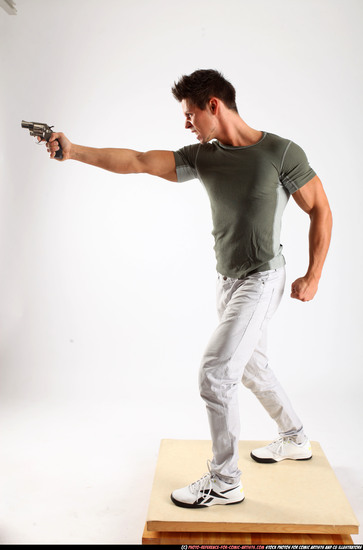 Man Adult Muscular White Fighting with gun Standing poses Casual