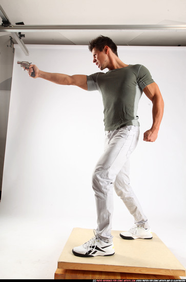 Man Adult Muscular White Fighting with gun Standing poses Casual