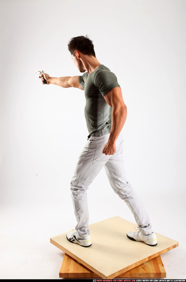 Man Adult Muscular White Fighting with gun Standing poses Casual