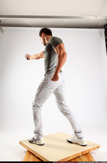 Man Adult Muscular White Fighting with gun Standing poses Casual