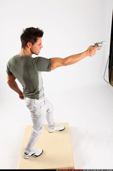 Man Adult Muscular White Fighting with gun Standing poses Casual