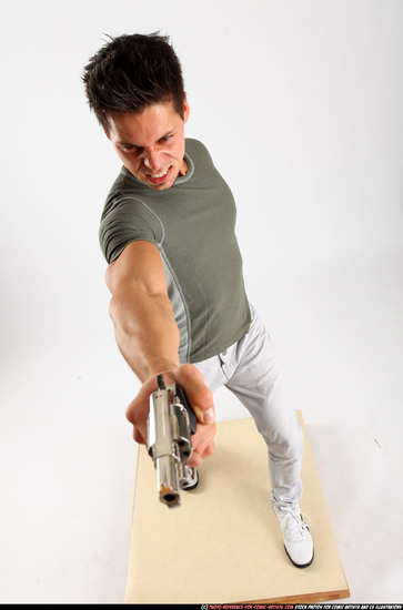 Man Adult Muscular White Fighting with gun Standing poses Casual