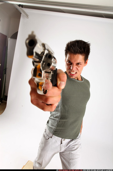 Man Adult Muscular White Fighting with gun Standing poses Casual