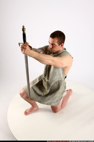 Man Adult Athletic White Fighting with sword Kneeling poses Army