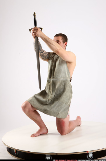 Man Adult Athletic White Fighting with sword Kneeling poses Army