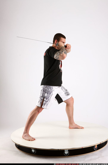 Man Adult Athletic White Fighting with sword Standing poses Sportswear