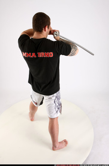 Man Adult Athletic White Fighting with sword Standing poses Sportswear